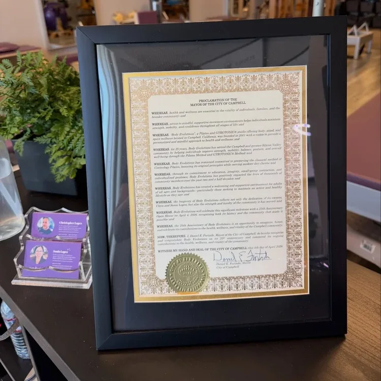 The City of Campbell proclamation honoring 25 years of Body Evolutions, framed at the front desk